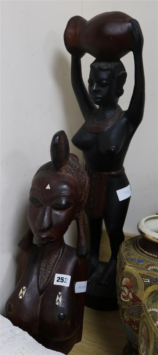 An African tribal figure and a similar bust